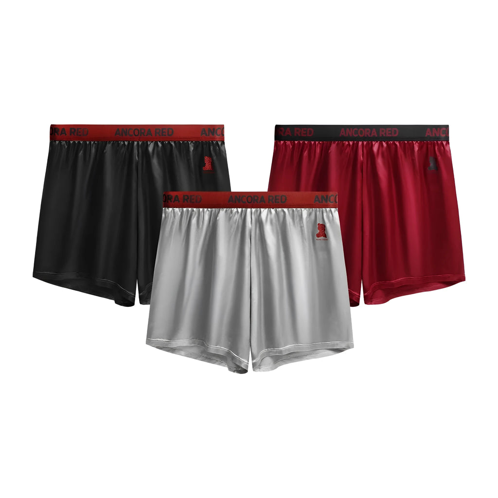 Men's solid colour boxer briefs in black, blue, brown, purple, red and silver options