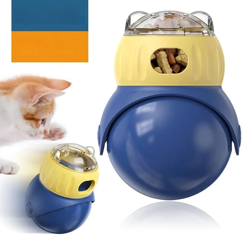 Owl-shaped plastic tumbler cat toy in morandi yellow and blue colours, designed as a puzzle food feeder.
