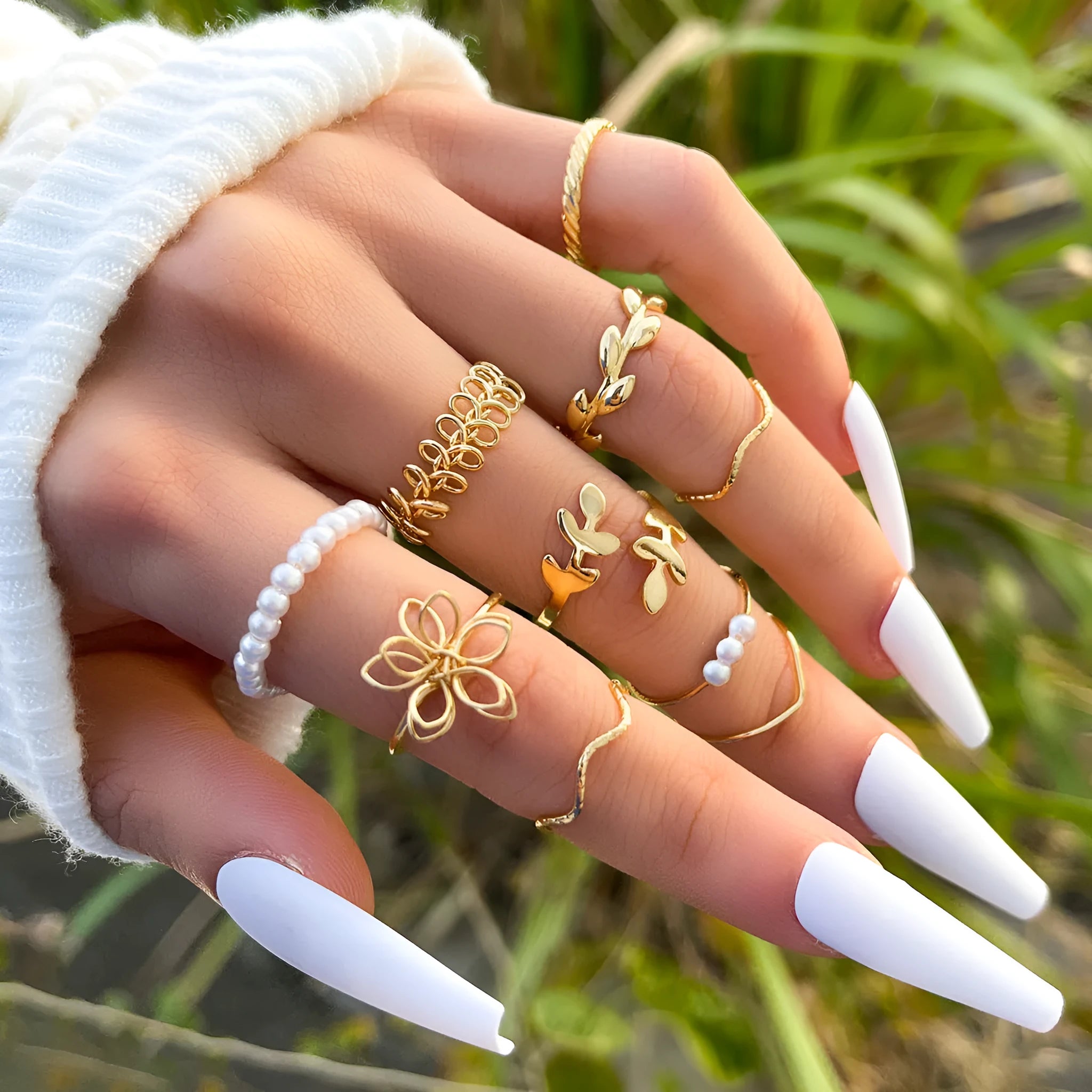 Women's alloy openwork flower ring with glossy electroplated gold finish
