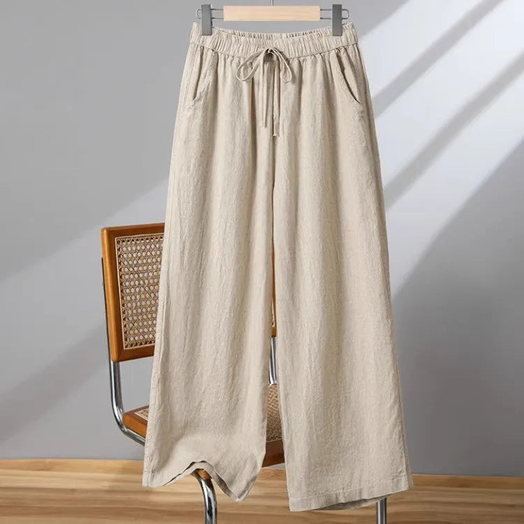 Women's straight-leg casual trousers in apricot colour with elastic drawstring waist