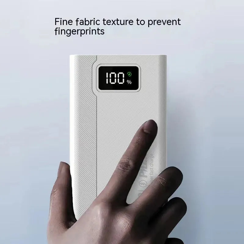 Large capacity power bank in black or white plastic shell with fast charging capability