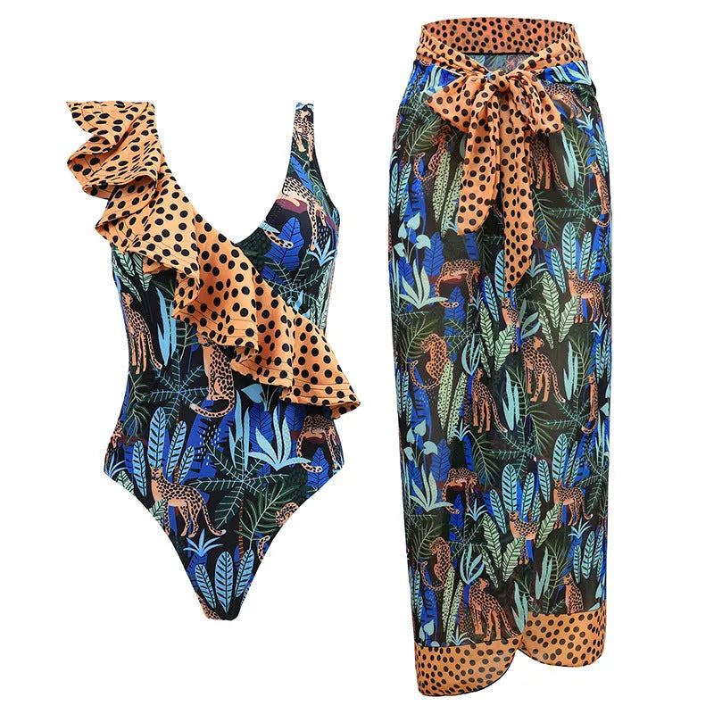 Women's solid colour one-piece swimsuit with spaghetti straps and a matching detachable skirt.