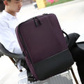 Medium waterproof nylon backpack in brown with zipper closure and soft surface finish for men and women