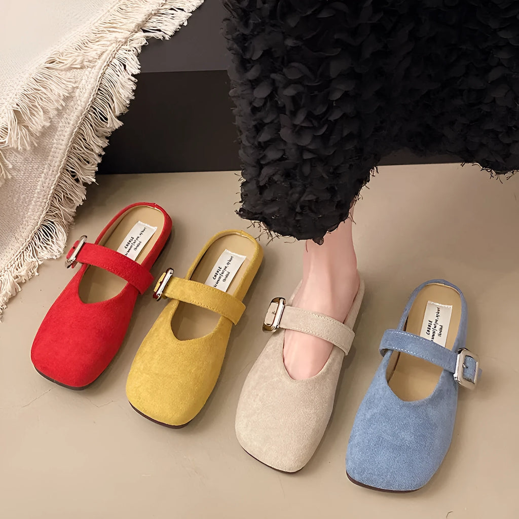 Women's flat apricot PU half slippers with closed square toe and rubber sole.