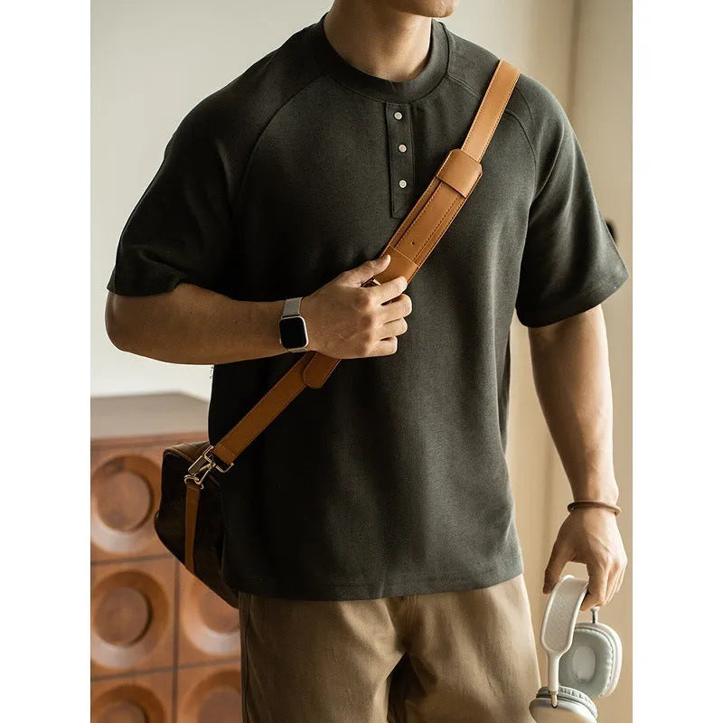 Casual loose pullover top with raglan sleeves in a terry texture fabric, shown in smoky grey.