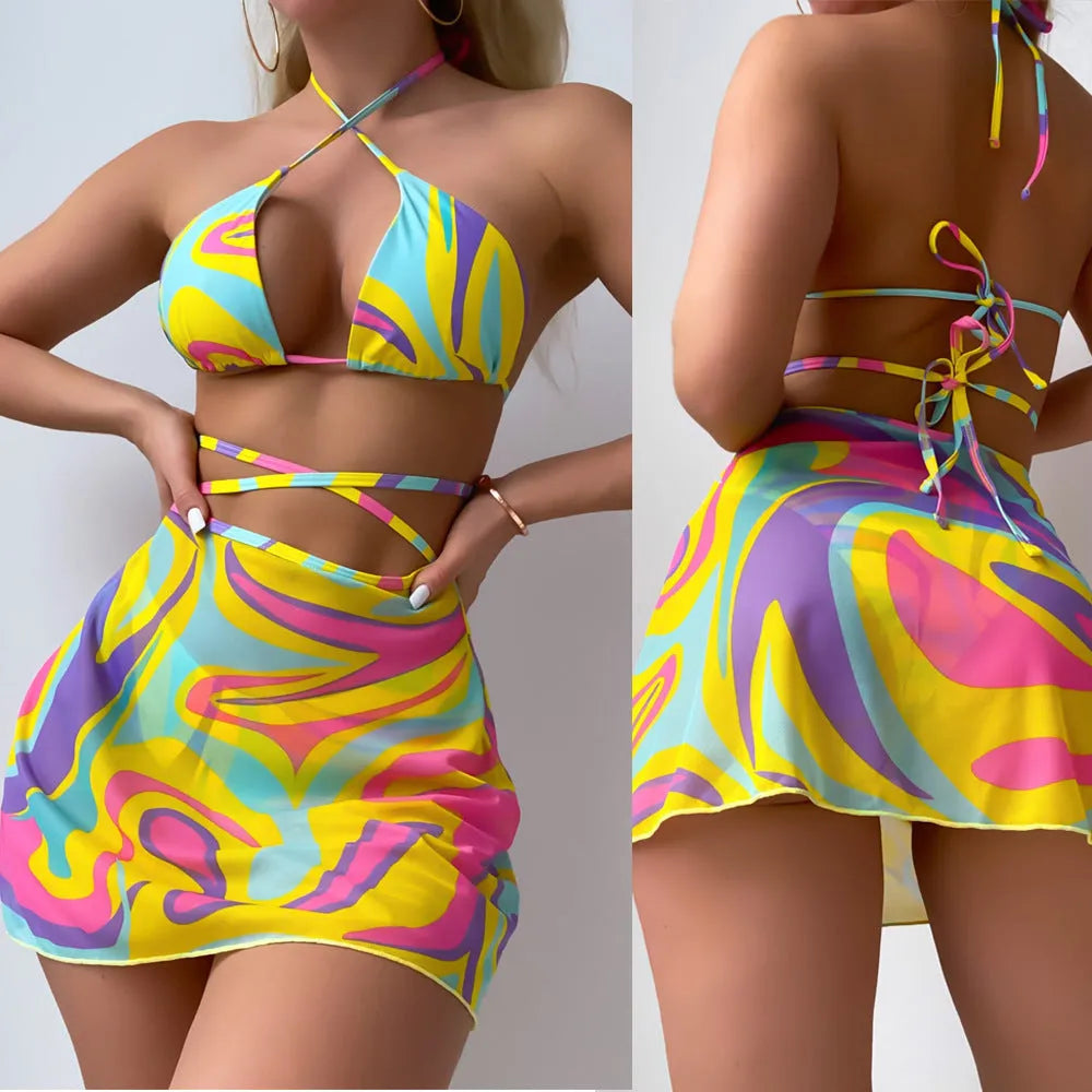 Yellow striped women's halter lace-up swimsuit set with matching skirt and shorts