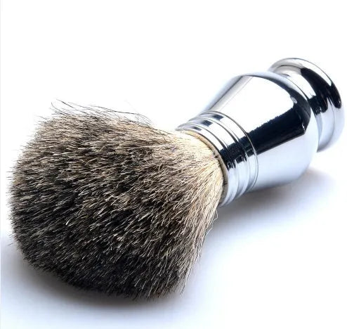 CSB men's shaving set with chrome double edge razor, badger hair brush on stand, zinc soap bowl, and blades in black box.