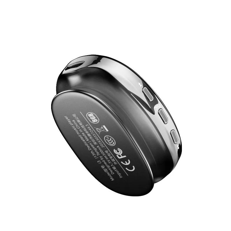 Blue Bluetooth MP4 music player with small OLED screen and push buttons on a black background.