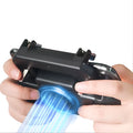 Black USB mobile game controller for smartphones on a grey background.