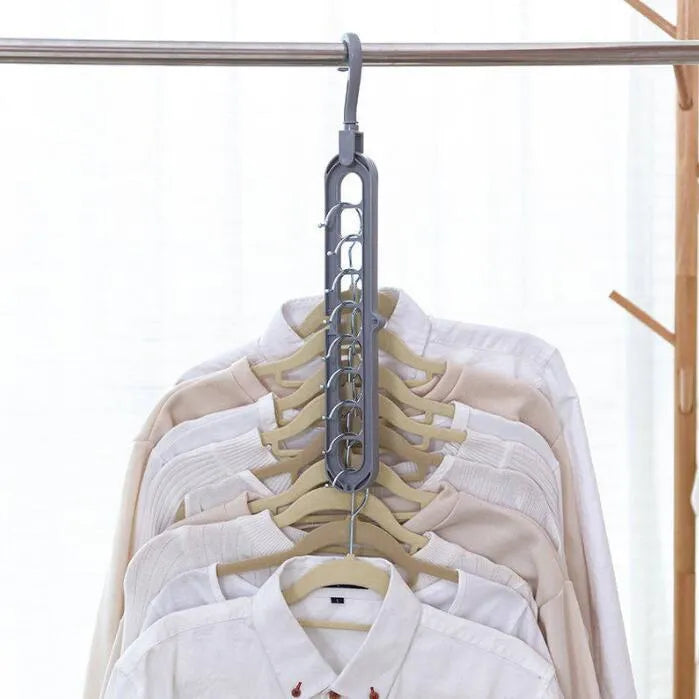 Plastic clothes hanger with rotating hook showing pink and green colour options