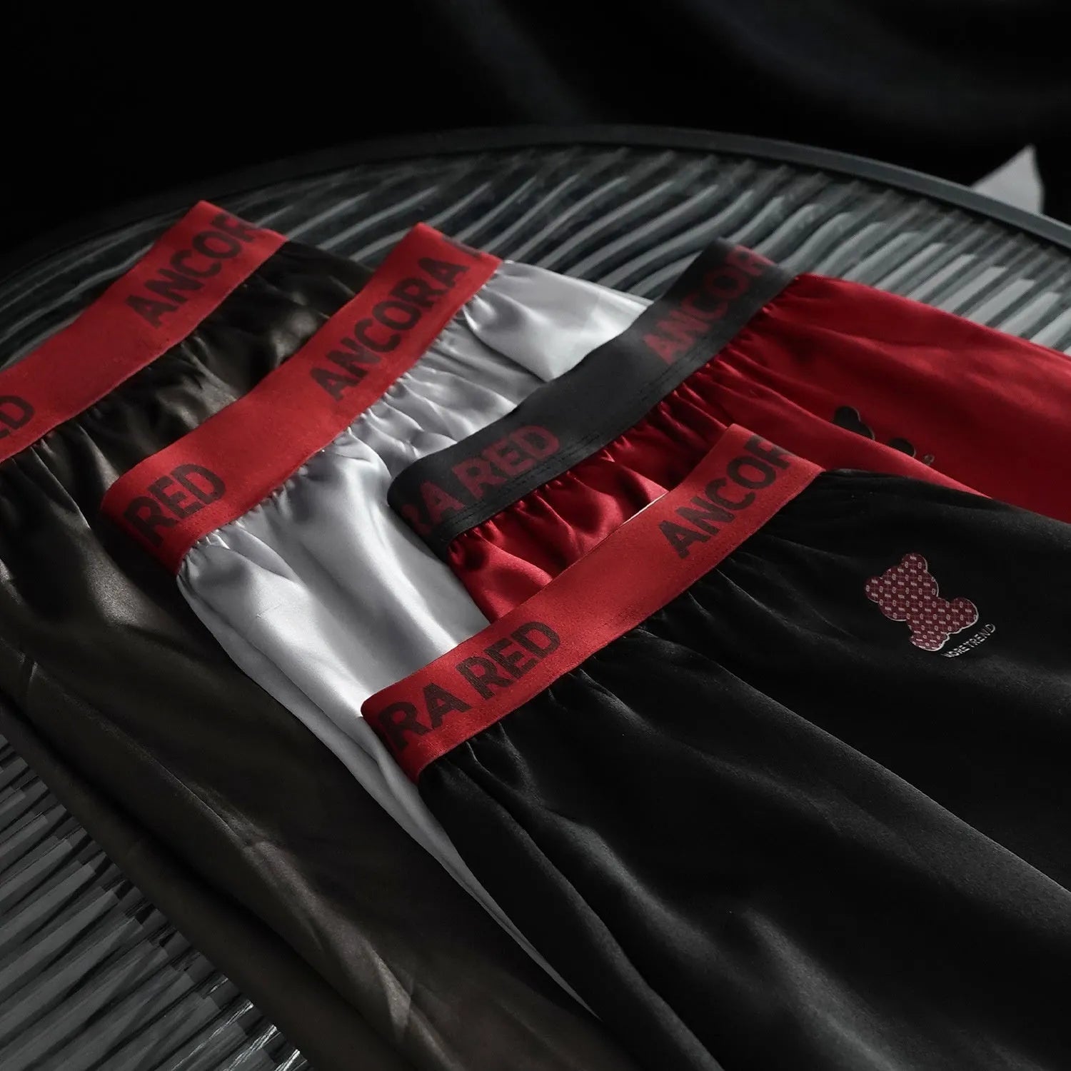 Men's solid colour boxer briefs in black, blue, brown, purple, red and silver options