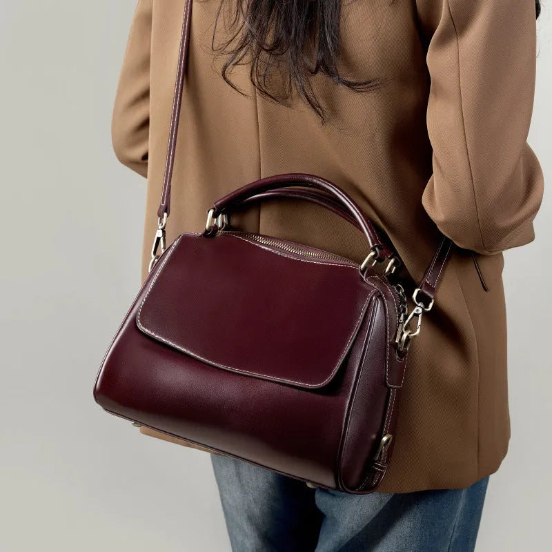 Genuine leather women's crossbody tote bag in cross square shape with double shoulder straps and multiple internal compartments