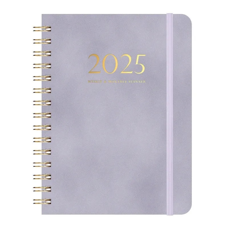 A5 leather notebook with metal coil binding showing multiple colour options including black, blue, brown, and green.