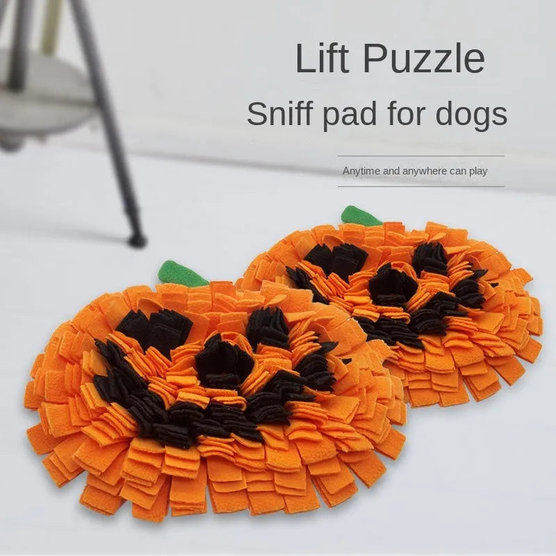 Orange pumpkin-shaped dog sniffing mat with removable pieces for slow feeding training