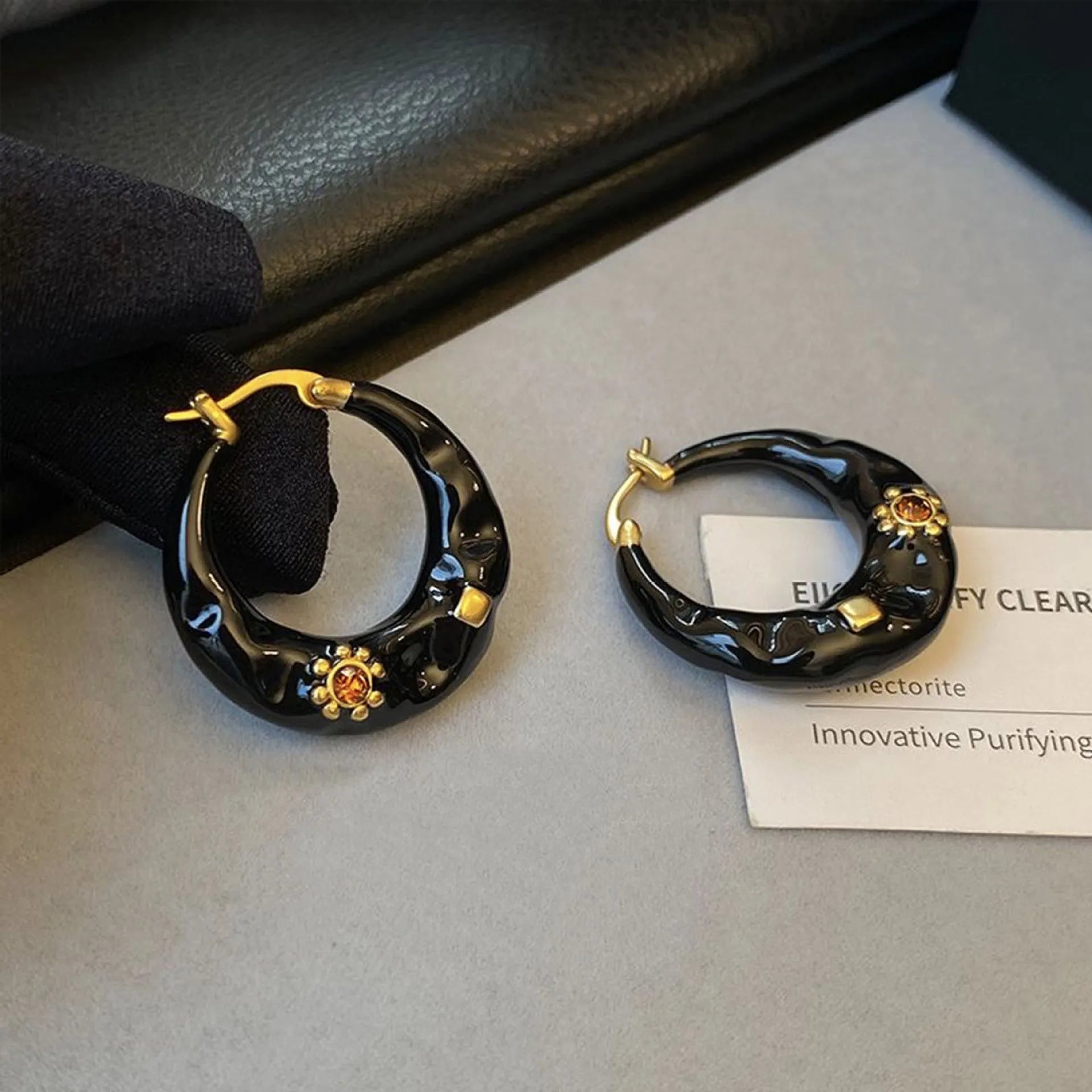 Hong Kong style retro rhinestone ear studs with dripping oil treatment in black and red colour options