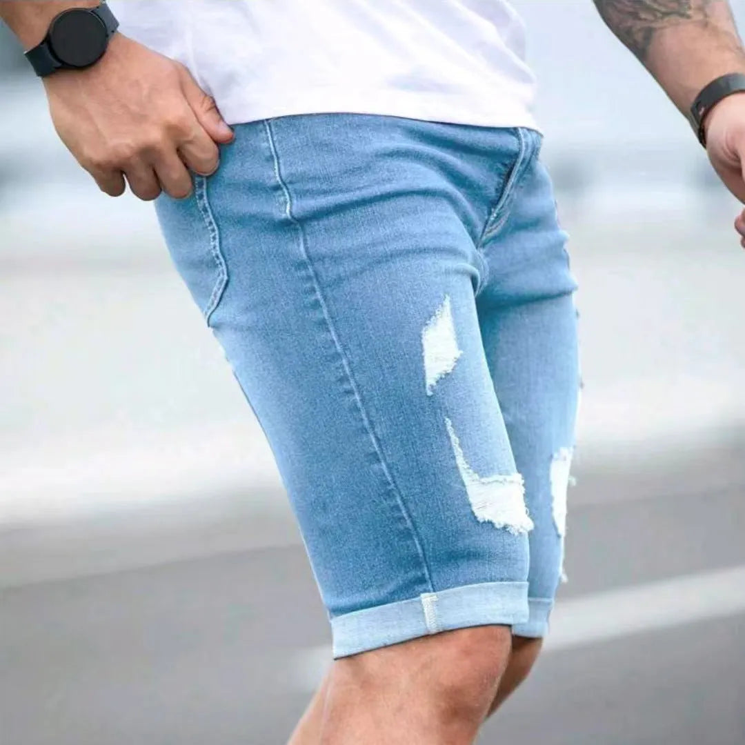 Men's sky blue denim shorts with distressed holes and straight leg cut