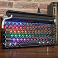 Dot retro-style black Bluetooth mechanical keyboard with RGB backlight on keys.