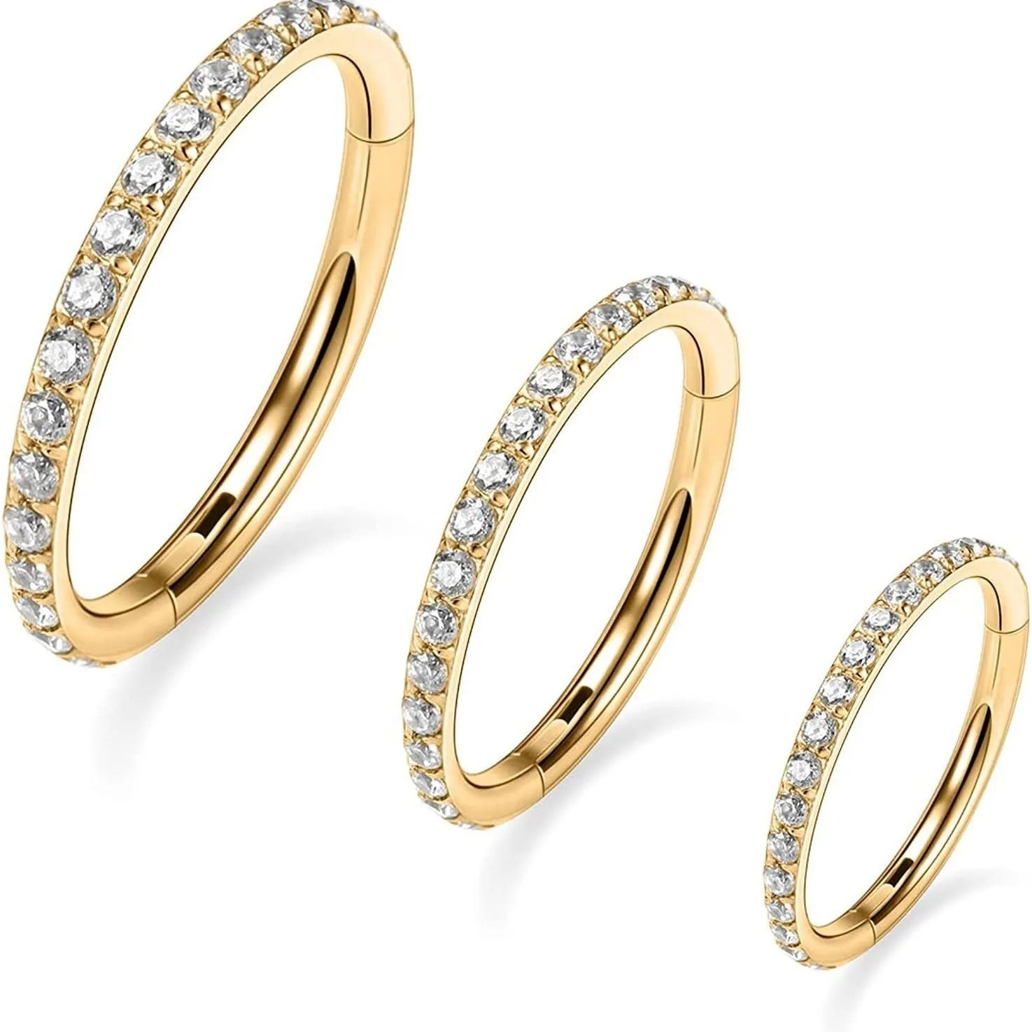 Close-up of a seamless round stainless steel nose ring with a diamond finish, showing colour options including gold, rose gold, and black.