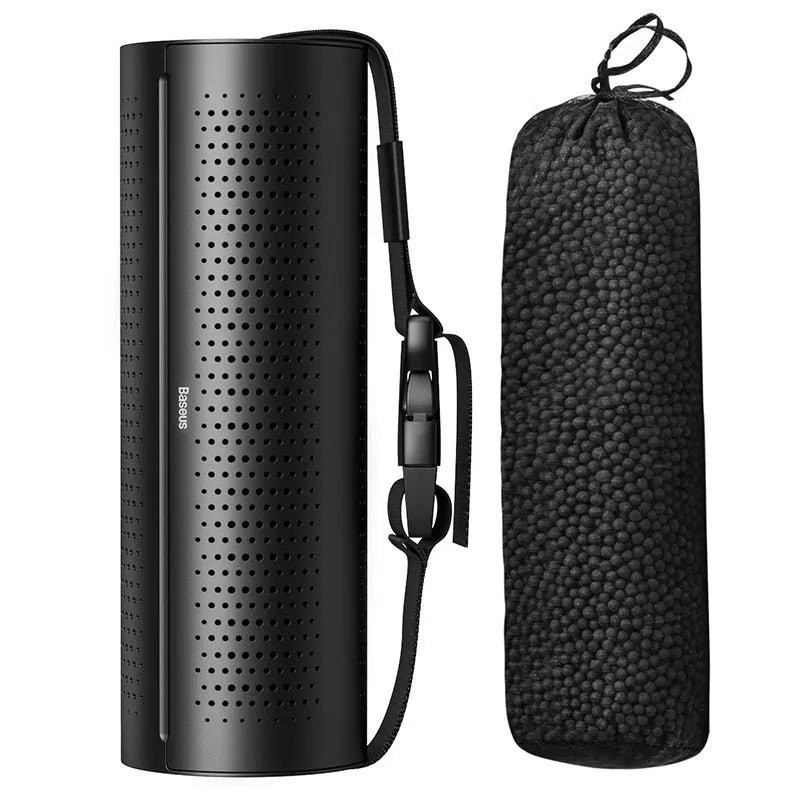 BASEUS black car air purifier with activated carbon crystal and magnetic enclosure on a car dashboard