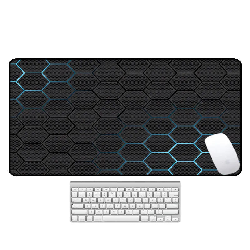 Large geometric pattern desk pad with natural rubber non-slip base on wooden desk