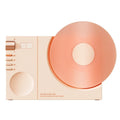 Mini Bluetooth portable speaker with card insertion slot in obsidian black, ivory white, coral pink, or plum green colour