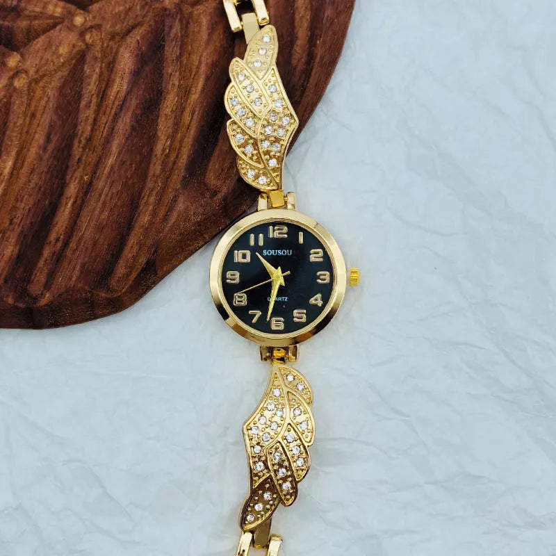 Women's stainless steel fashion watch with round dial showing gold surface option