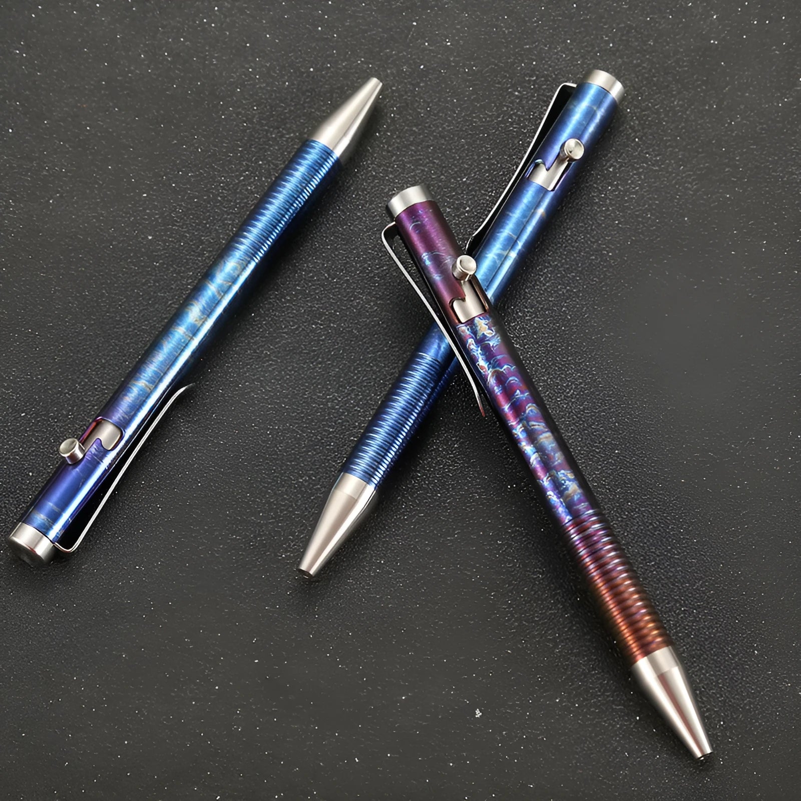 Titanium alloy gun bolt handle ballpoint pen with phantom colour finish showing knurled grip texture