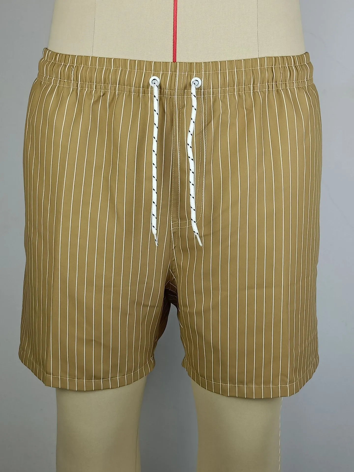 Polyester fibre striped swim shorts in navy blue, grey, khaki, or light blue with straight leg cut