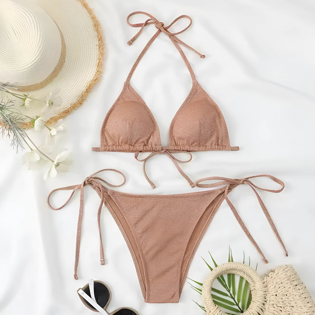 Women's bandage-style bikini swimsuit in polyester available in six colours with detailed size chart