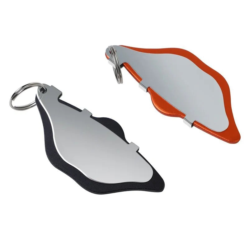 Mountain bike disc brake pads in black or orange with adjustable flap