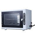 Small silver ultraviolet sterilizer with stainless steel chamber for salon tool hygiene.