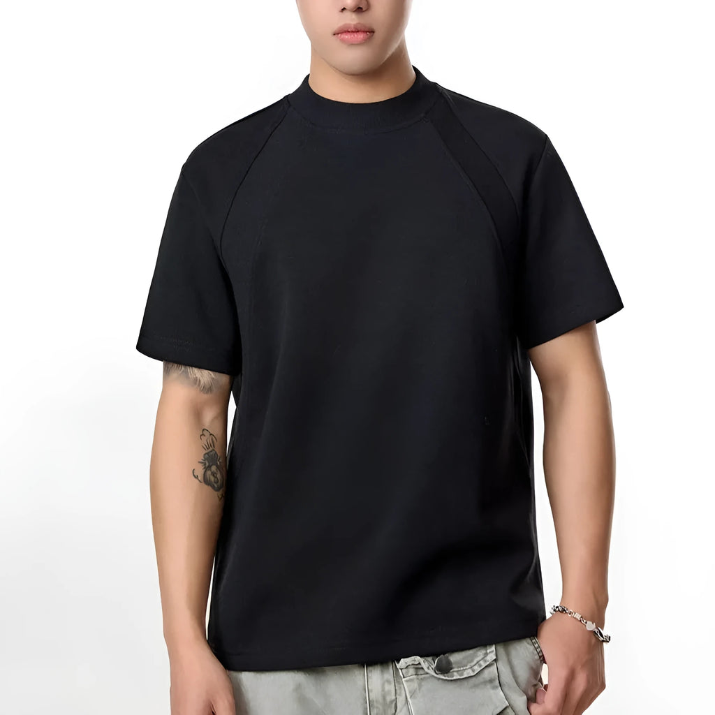 Loose-fit short sleeve top with textured air layer stitching in black.