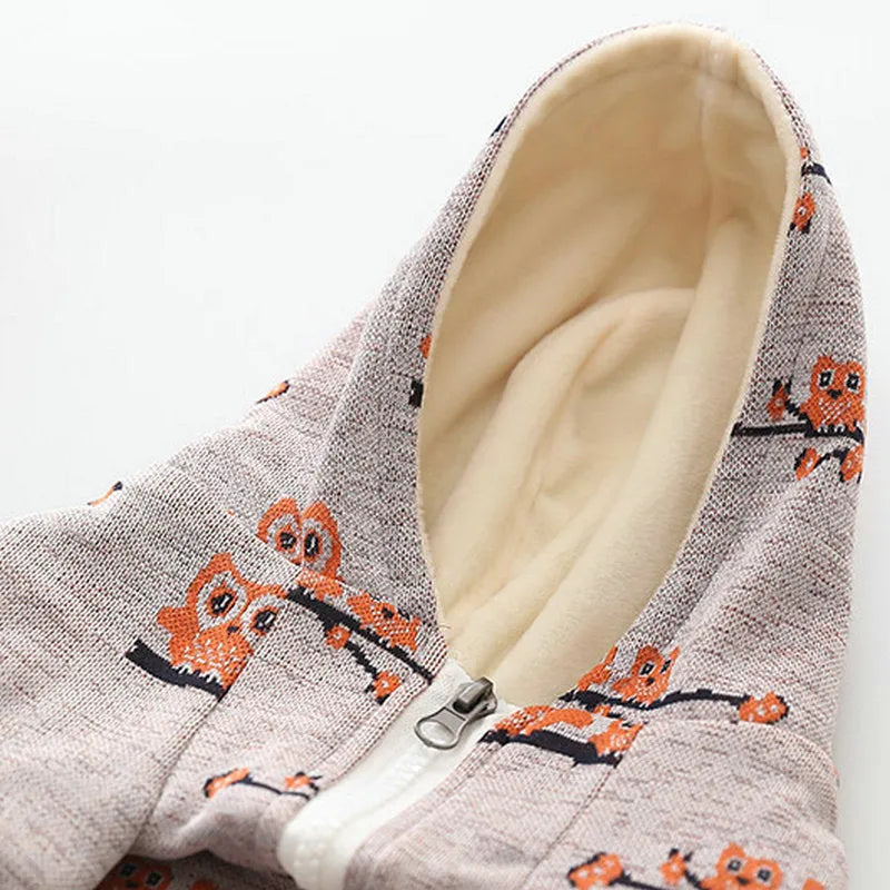 Blue and pink dog sweater with zipper front closure in cotton material showing pattern details