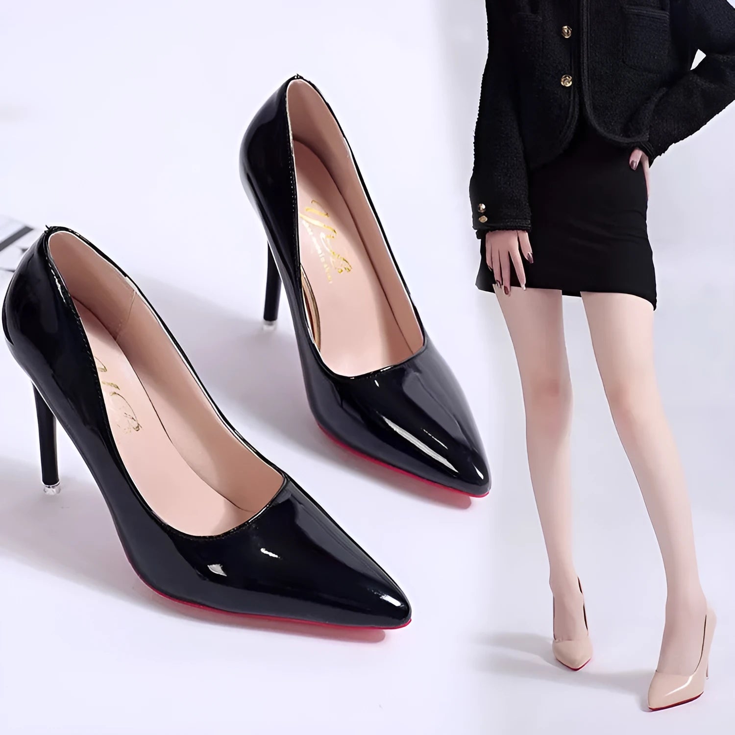 Women's solid colour pointed toe stiletto pump in black with a shallow mouth design