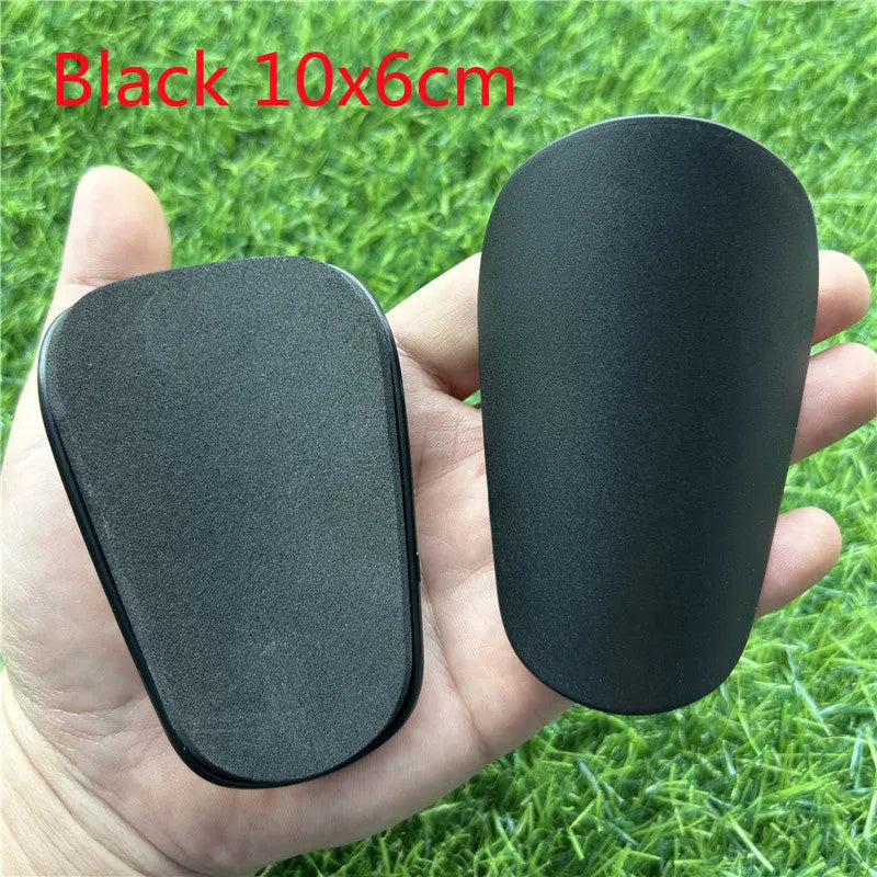 Extra small mini football shin guards in 8x5cm plastic construction