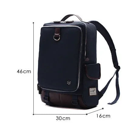 Large grey Korean-style backpack made of Oxford cloth, shown next to a laptop for scale.