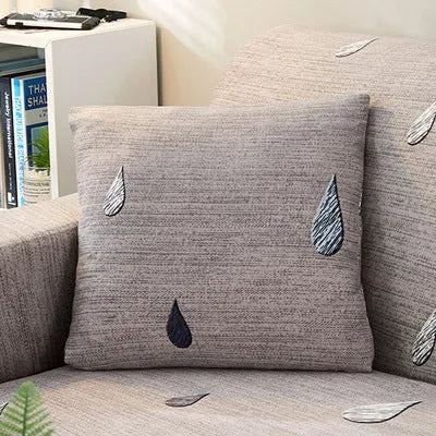 Geometric pattern stretch sofa slipcover fitted on a double seat sofa