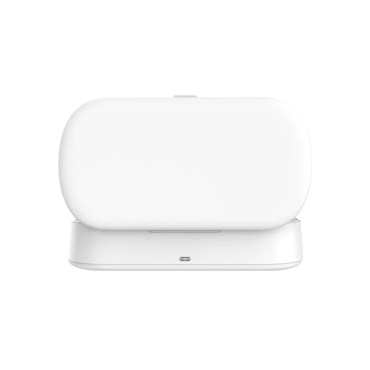 White ultraviolet steriliser box with wireless charging for mobile phones and small items.