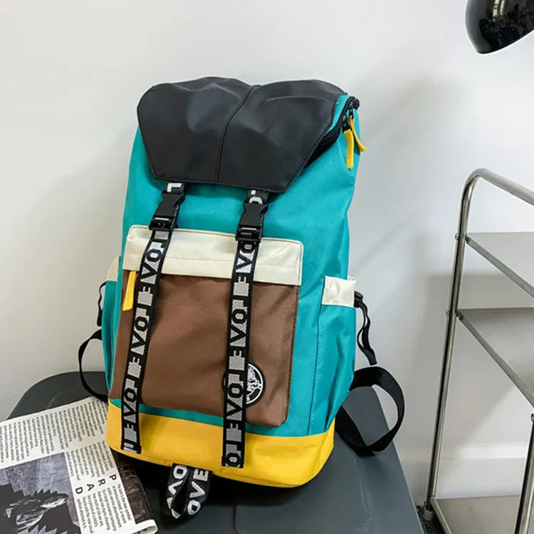 Oxford cloth backpack in black showing handheld strap and shoulder straps