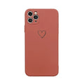Solid colour silicone TPU phone case for Apple iPhone on a table.
