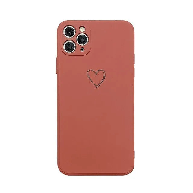 Solid colour silicone TPU phone case for Apple iPhone on a table.