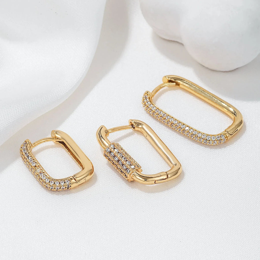 Three geometric square ear clips with inlaid zircon stones in gold and white colour options