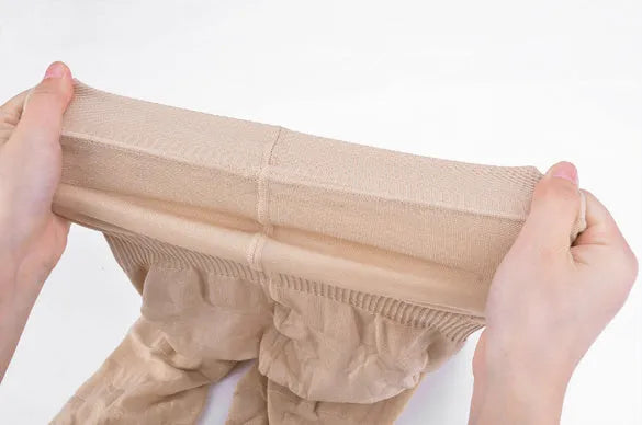 Women's high waist seamless shapewear shorts for tummy control in black and nude.