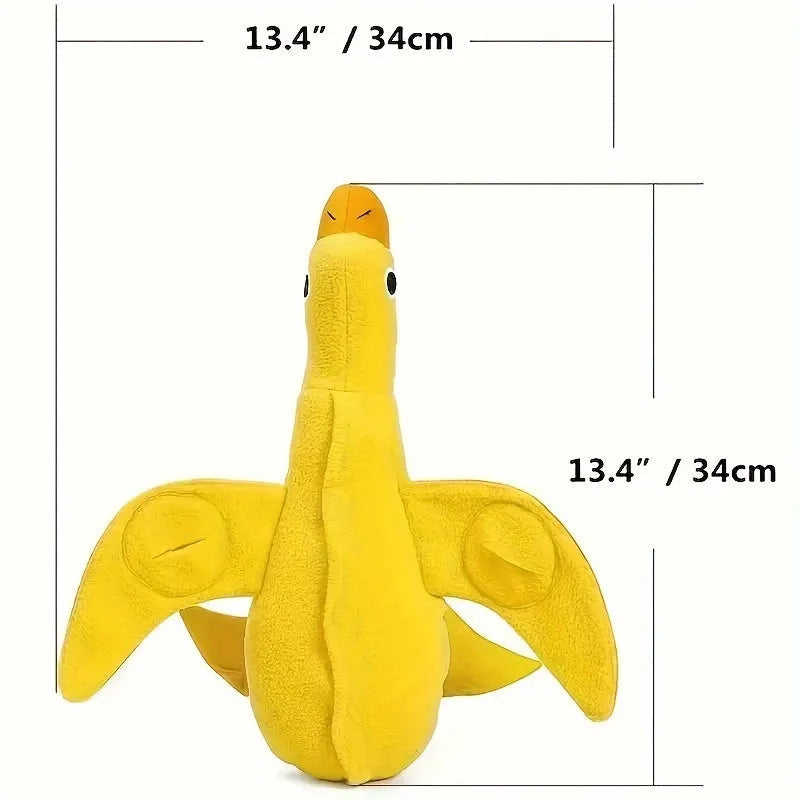 Yellow plush dog toy with attached rubber duck and a treat slot on a white background.