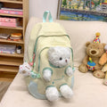 Nylon school backpack in macaron colour with curved shoulder strap and pendant, 20-35L capacity