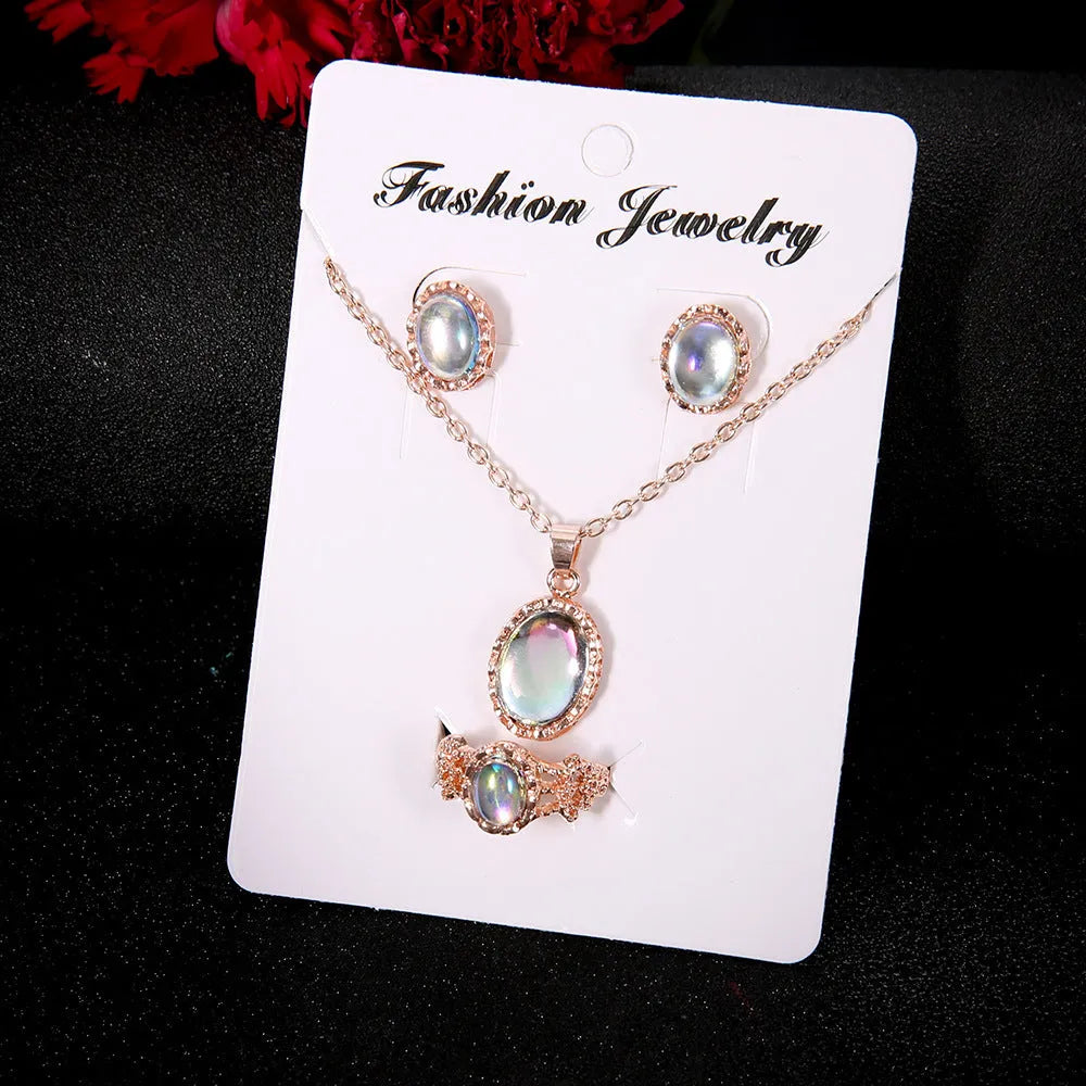 Geometric alloy and acrylic gemstone jewellery set with necklace, earrings, and ring in colour Sku1037