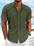 Men's solid colour casual short sleeve shirt in cotton blend fabric on a hanger.