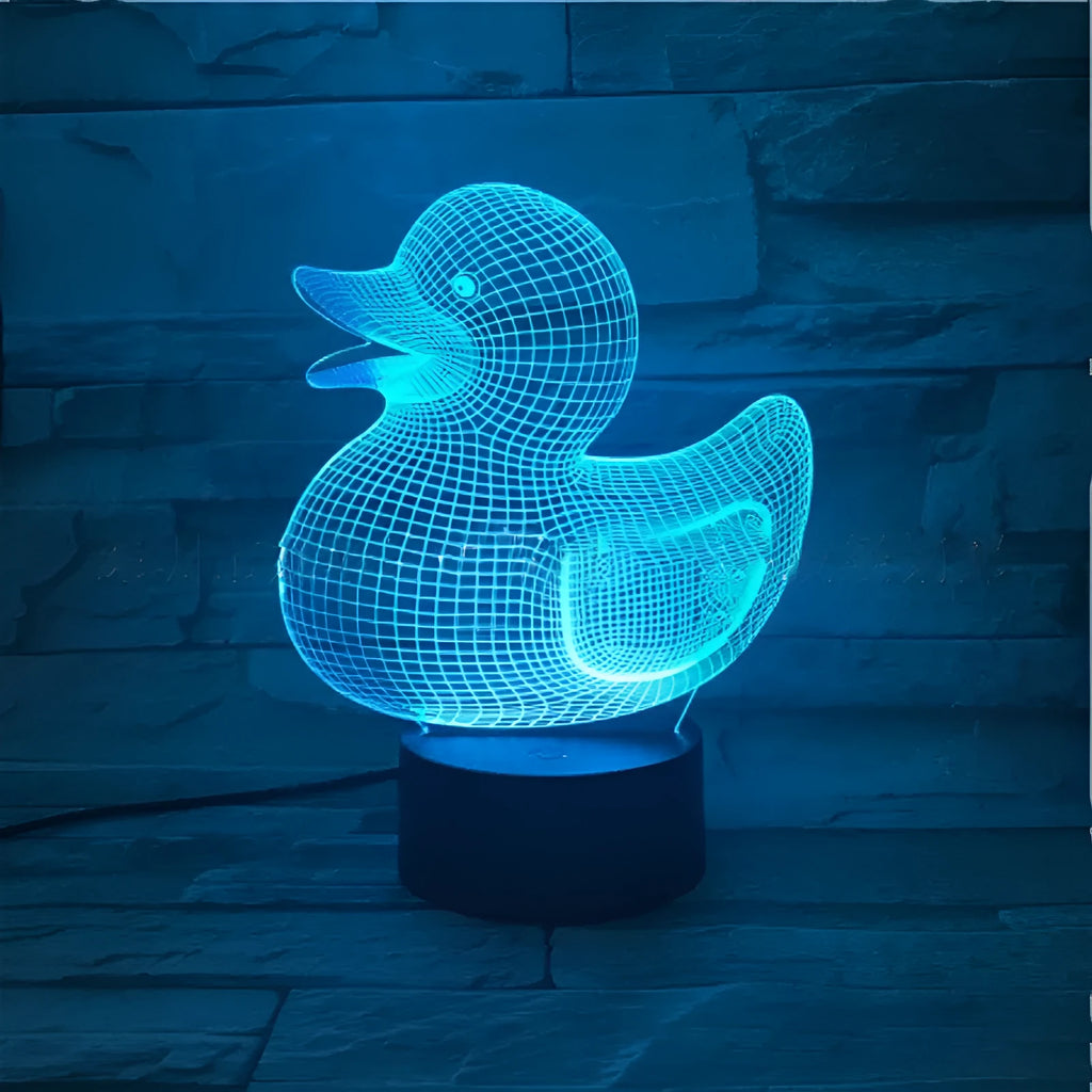 Little yellow duck 3D acrylic night light with remote control on ABS base, showing multi-colour glow.