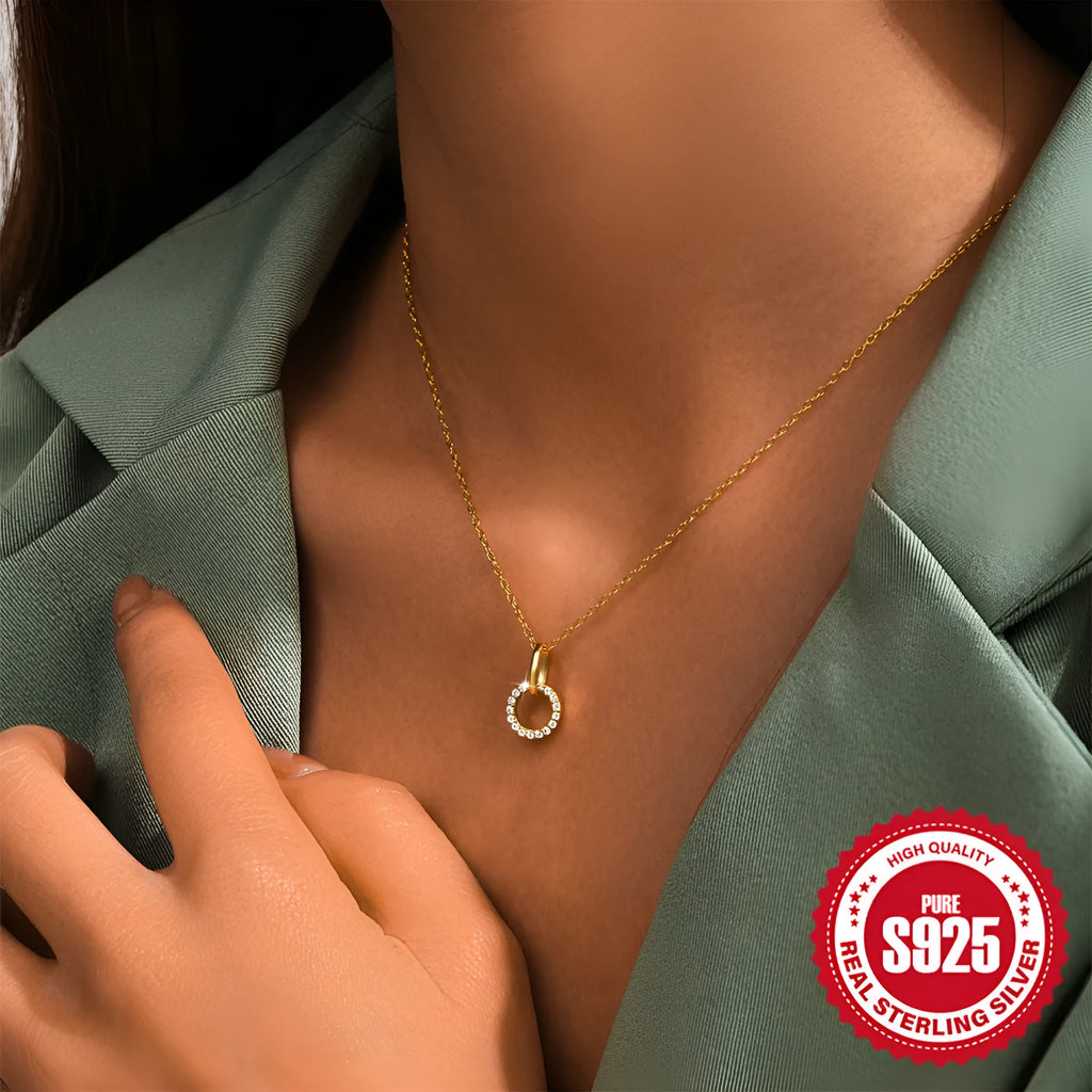 Gold-coloured S925 sterling silver clavicle necklace with a geometric interlocking zircon pendant on an adjustable chain.