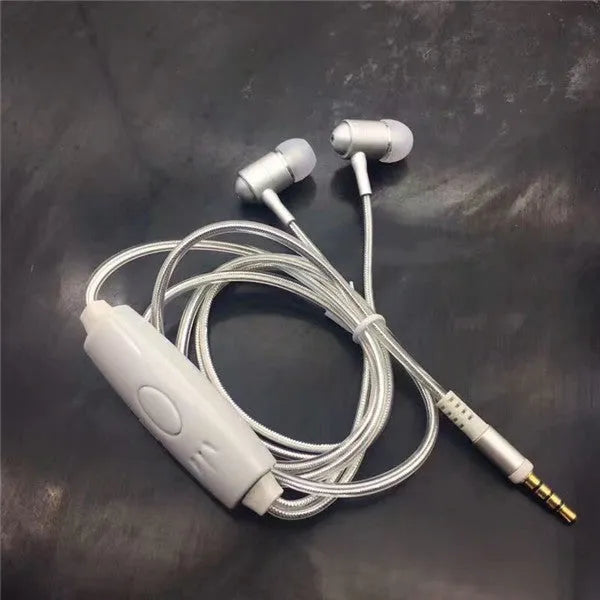 Magic Light LED Earphones with illuminated cable and aluminium alloy earpieces in blue, green, or pink.